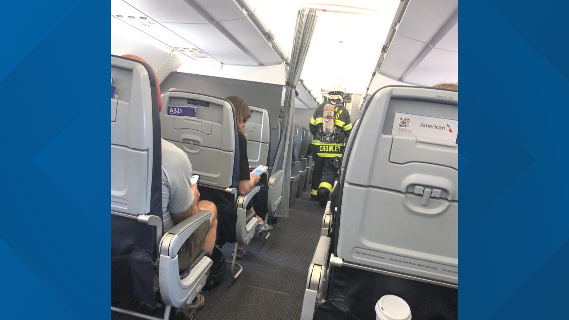 Passengers react after fire starts on flight bound for Phoenix