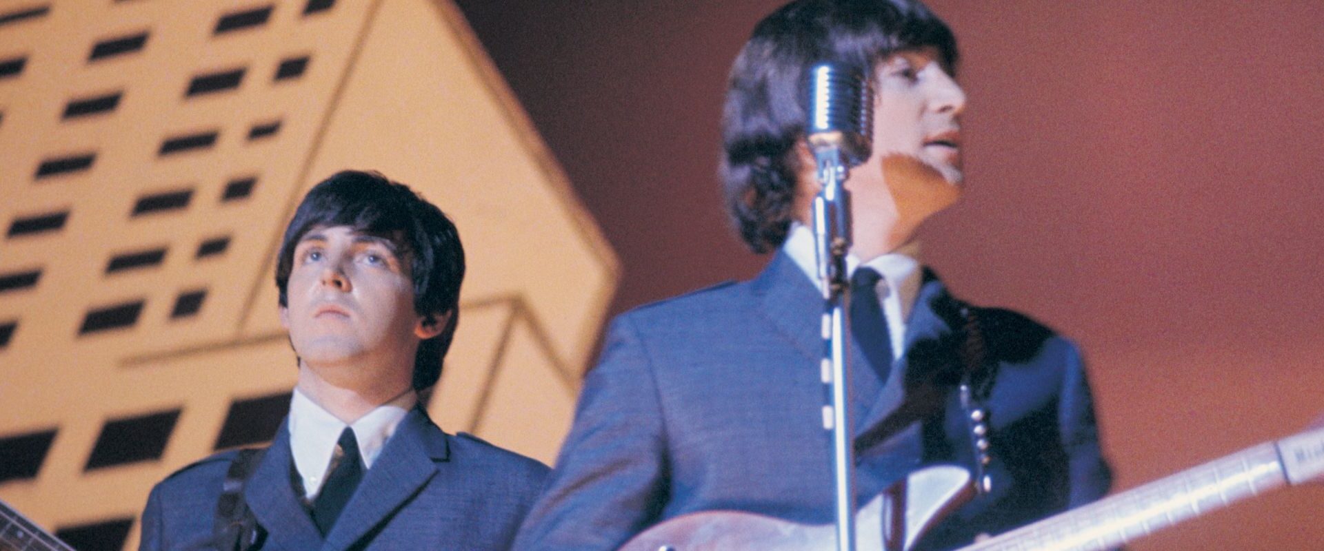John Lennon and Paul McCartney performing