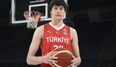 Turkish international Kerem Konan poses with national team jersey and basketball, accessed Aug. 18, 2025. (AA Photo)