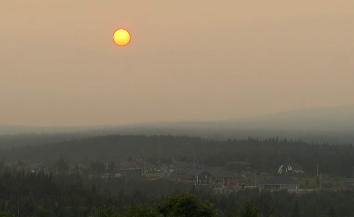 Smoky sky with orange sun