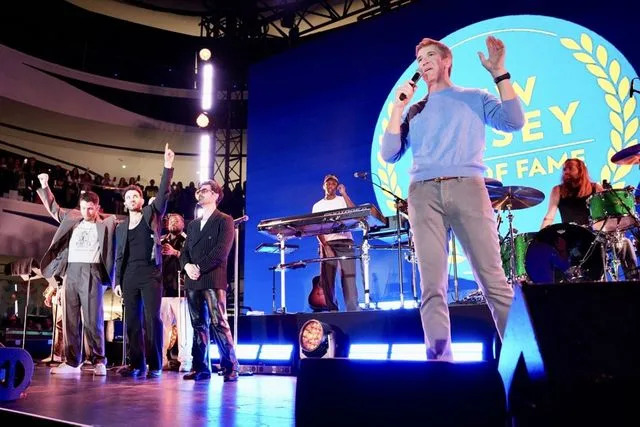 New Jersey Hall of Fame Eli Manning announces that the Jonas Brothers are inductees to the New Jersey Hall of Fame on March 23, 2025 at JonasCon in the American Dream Mall