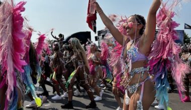 Revellers parade along Lakeshore Boulevard for annual Toronto Caribbean Carnival