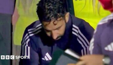 Ruben Amorim sat in the dugout looking down