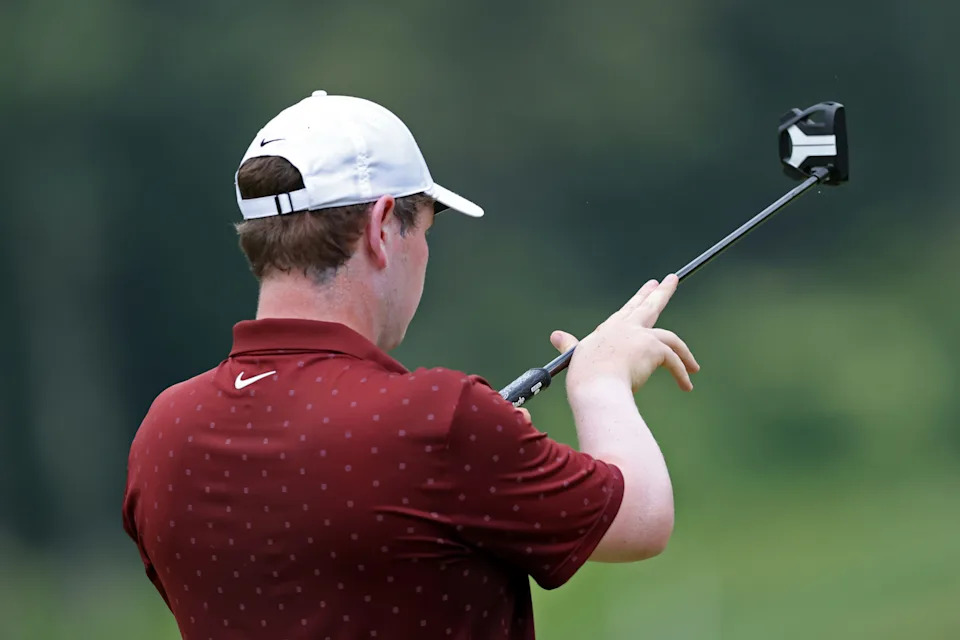 Robert MacIntyre lines up a putt on the fourth green during the first round of the 2025 BMW Championship at Caves Valley Golf Club.