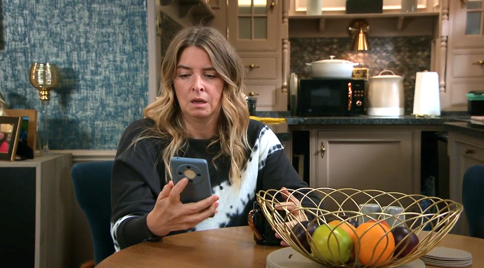 charity dingle receives shocking text from mackenzie boyd's phone, emmerdale