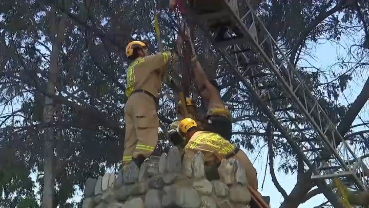 Firefighters free woman stuck in chimney in San Fernando – NBC Los Angeles