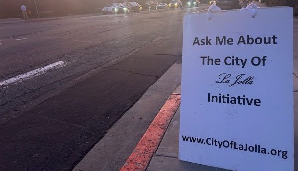 Signs were placed around La Jolla last year encouraging people to sign a petition supporting potential cityhood. (Mark Munoz)
