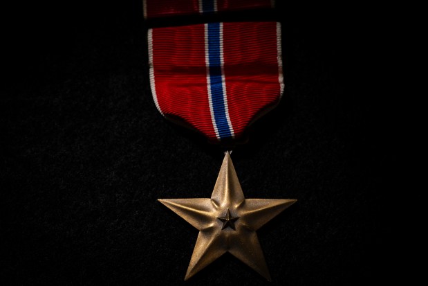 A Bronze star was awarded to Stephen Grabowski, a WWII vet from Chicago who died in 1974. The medal, along with Grabowski's Purple Heart medal, ended up in the unclaimed property section vault of the Illinois Treasurer's Office in Springfield. (E. Jason Wambsgans/Chicago Tribune)