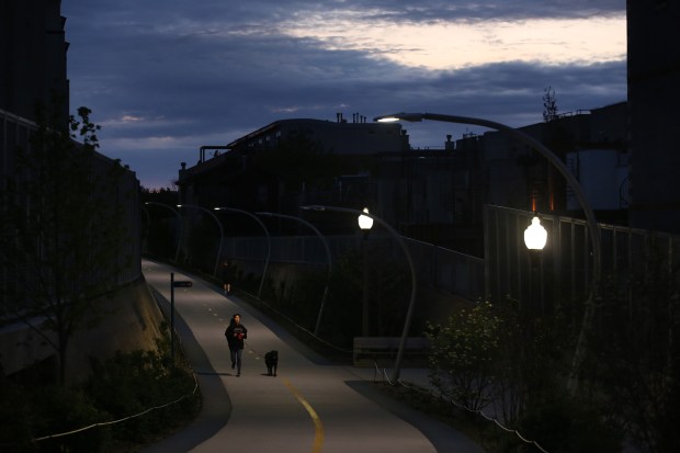 Night falls on The 606 trail in Chicago, May 17,...