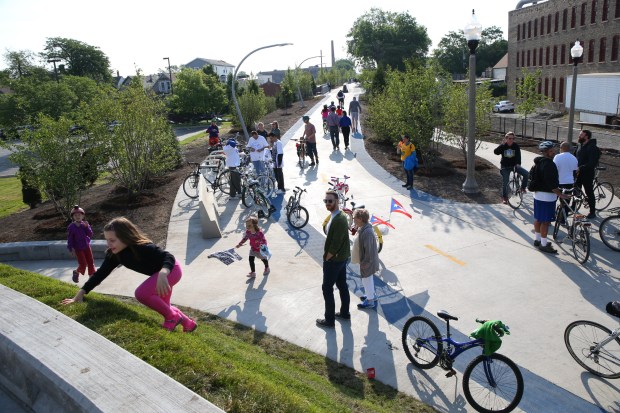People gather at the Western Avenue entrance to The 606...