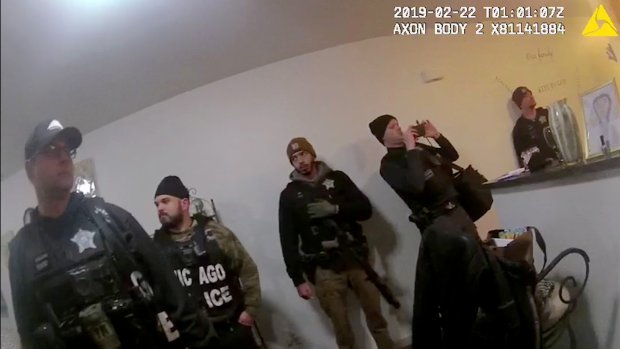 Body camera footage shows a team of Chicago police officers conducting a raid on social worker Anjanette Young's home on Feb. 21, 2019. (Chicago Police Department)