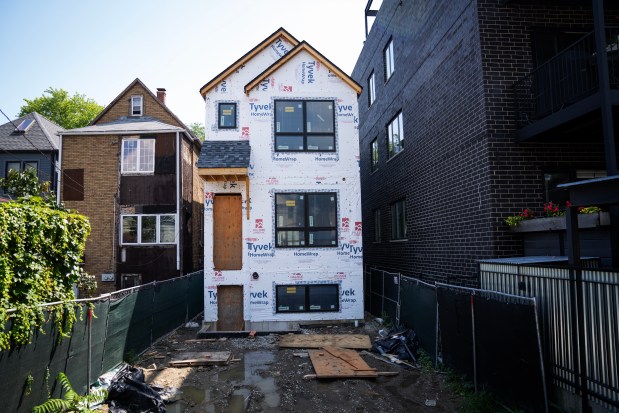 A new two-flat under construction in the Humboldt Park neighborhood, Aug. 13, 2025. (E. Jason Wambsgans/Chicago Tribune)