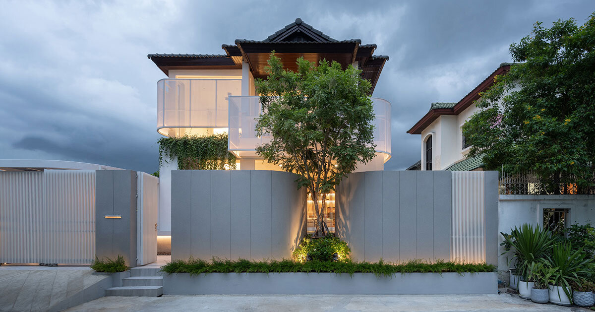 curved textile facades wrap reborn house in bangkok village