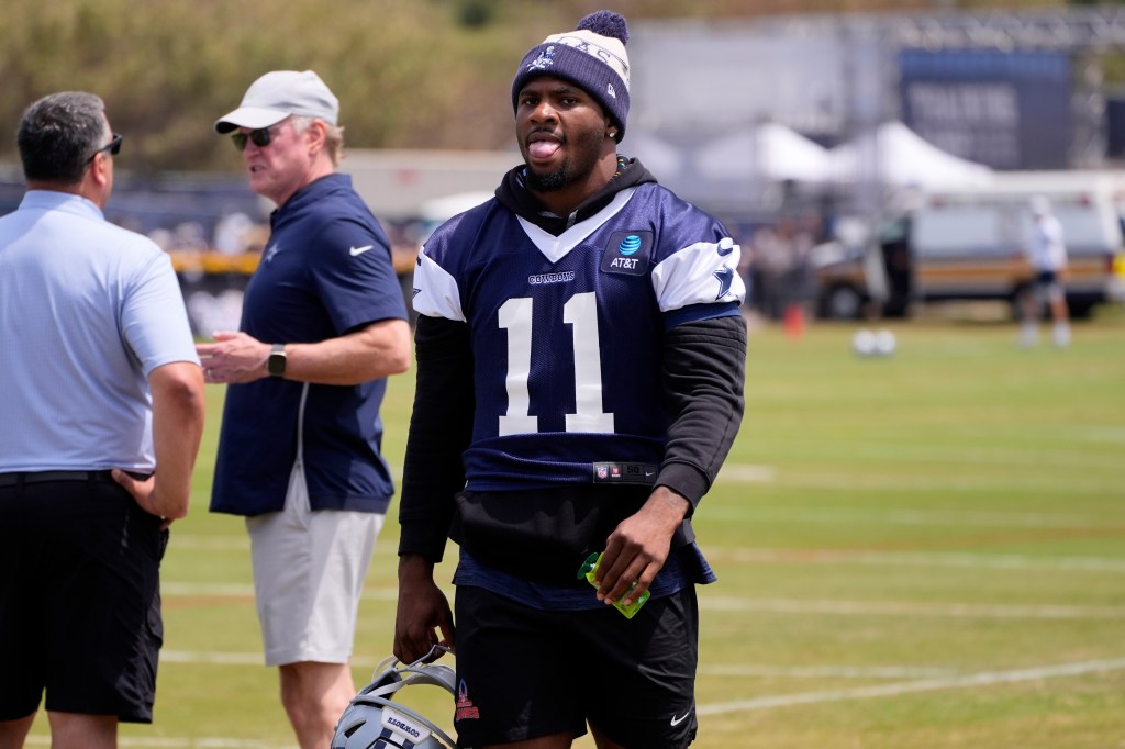 Dallas Cowboys defensive end Micah Parsons walks on the field during training camp Saturday, July 26, 2025, in Oxnard, Calif.