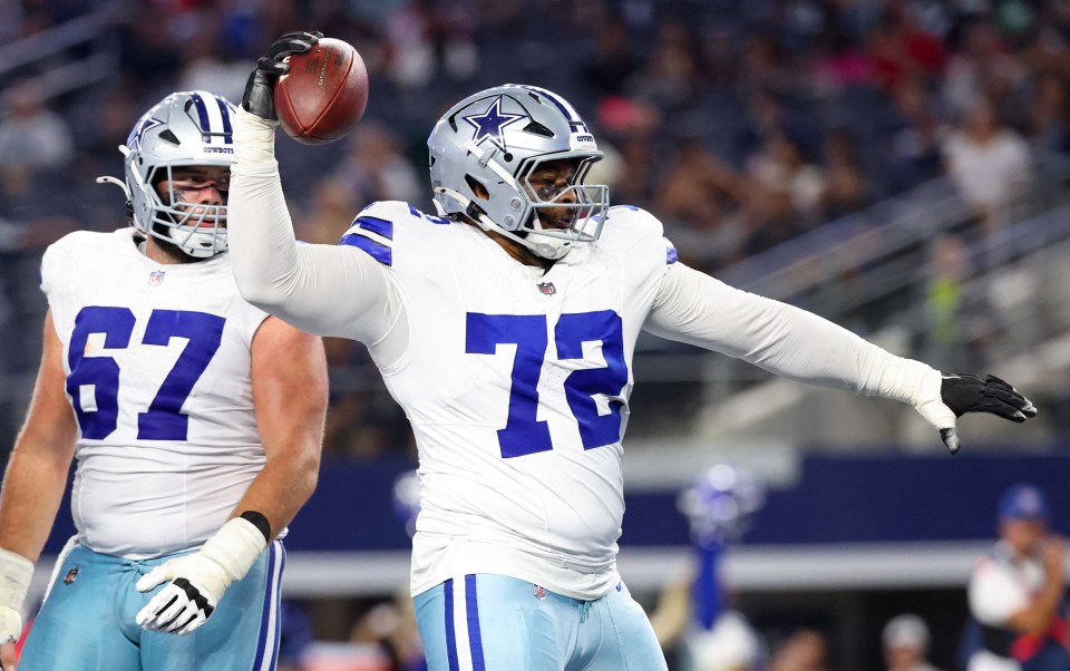 La'el Collins #72 of the Dallas Cowboys celebrating a touchdown.