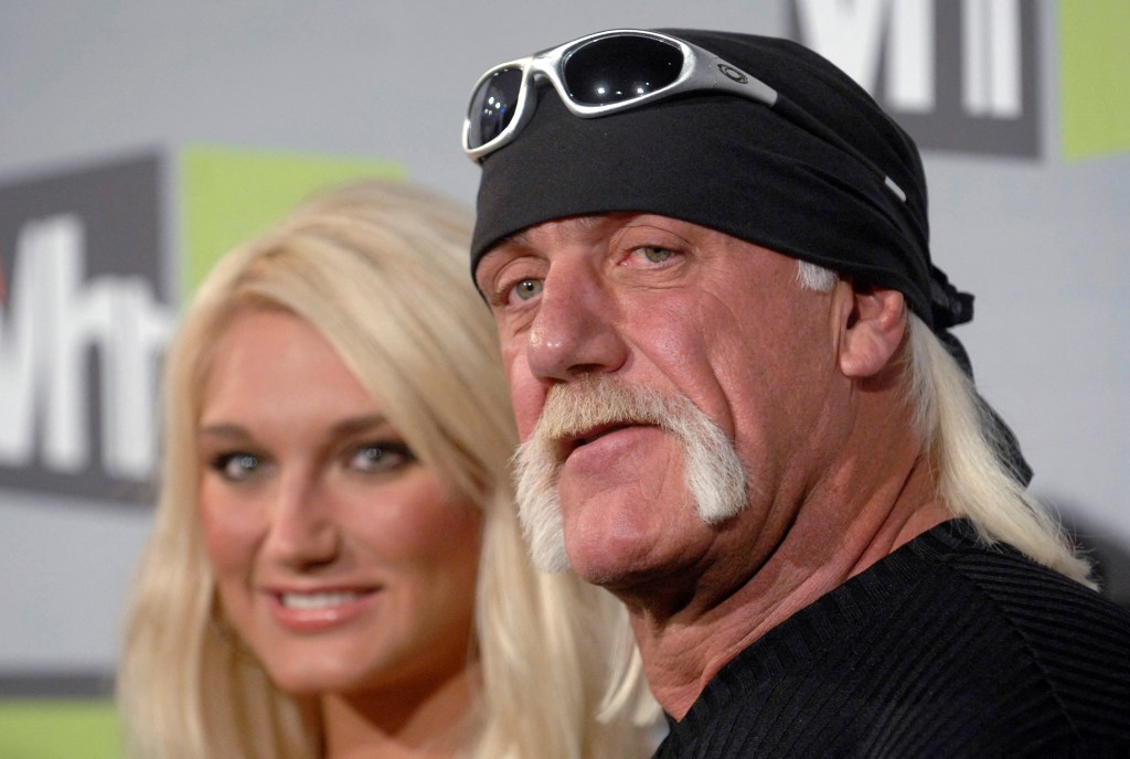 Hulk Hogan and his daughter Brooke Hogan at an awards ceremony.