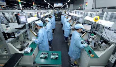 China's factory output, retail sales growth slump in blow to economy