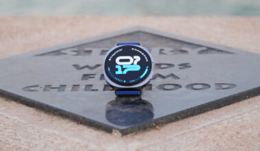 The Samsung Galaxy Watch 8 showing an athletic watch face on a plaque.