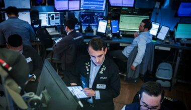 Morning Bid: Tariffs hit, Apple rises