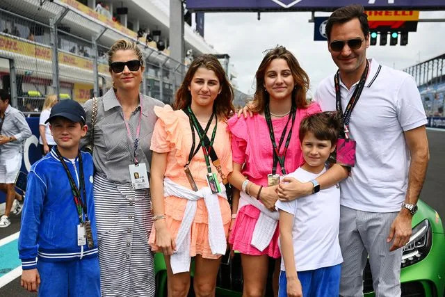 Clive Mason//Formula 1 via Getty  Roger Federer with his family prior to the F1 Grand Prix of Miami on May 07, 2023 in Miami, Florida.
