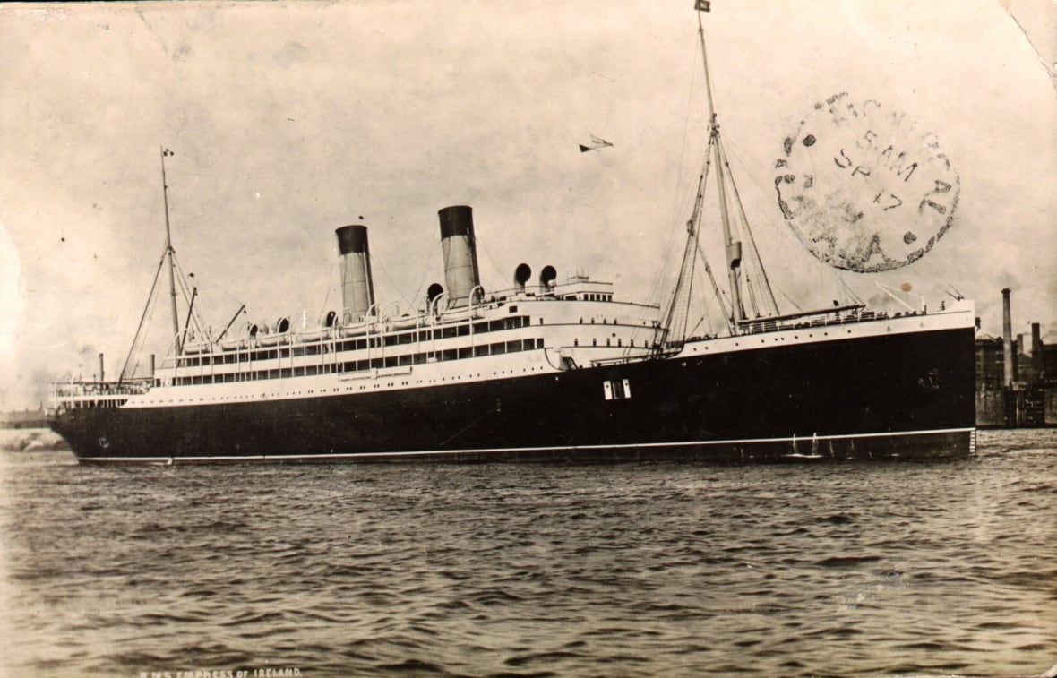 A black and white photo of a ship