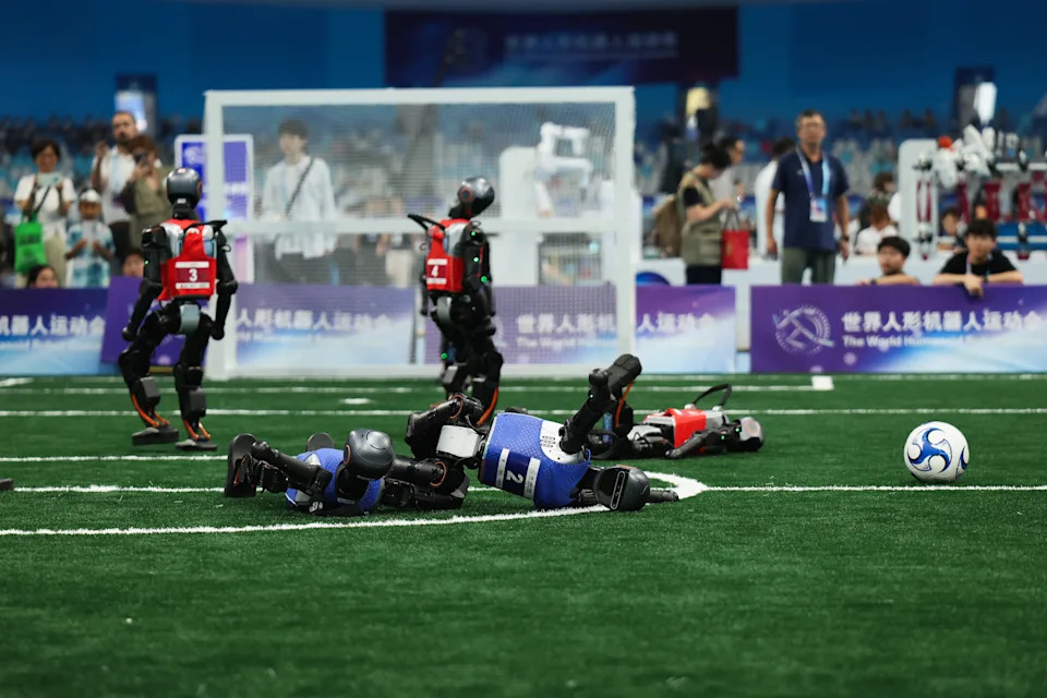 Man - er - robot down! (Lintao Zhang/Getty Images)