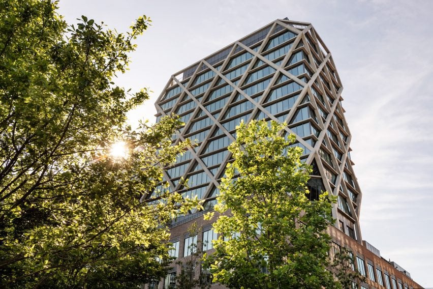 A 16-storey glass tower wrapped in a criss-crossing concrete structure
