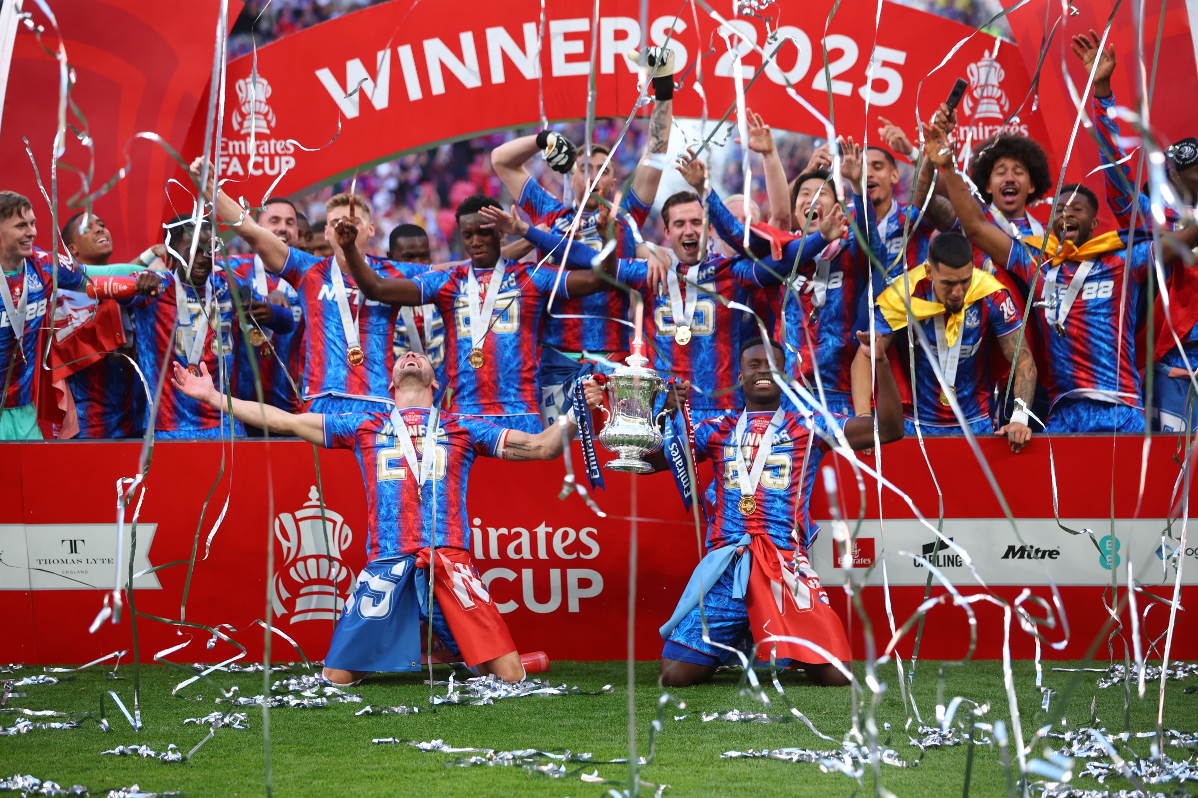 LONDON, ENGLAND - MAY 17: Joel Ward and Marc Guehi of Crystal Palace celebrate with FA Cup Trophy and teammates including Daichi Kamada, Eddie Nketiah, Chris Richards, Eberechi Eze of Crystal Palace, after winning the Emirates FA Cup Final match between Crystal Palace and Manchester City at Wembley Stadium on May 17, 2025 in London, England. (Photo by Ed Sykes/Sportsphoto/Allstar via Getty Images)
