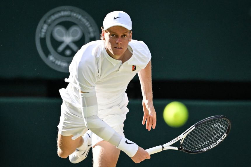 Sinner hits a shot during July's Wimbledon final.