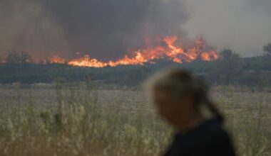 French firefighters battle to contain blaze that killed elderly woman and tore through area bigger than Paris