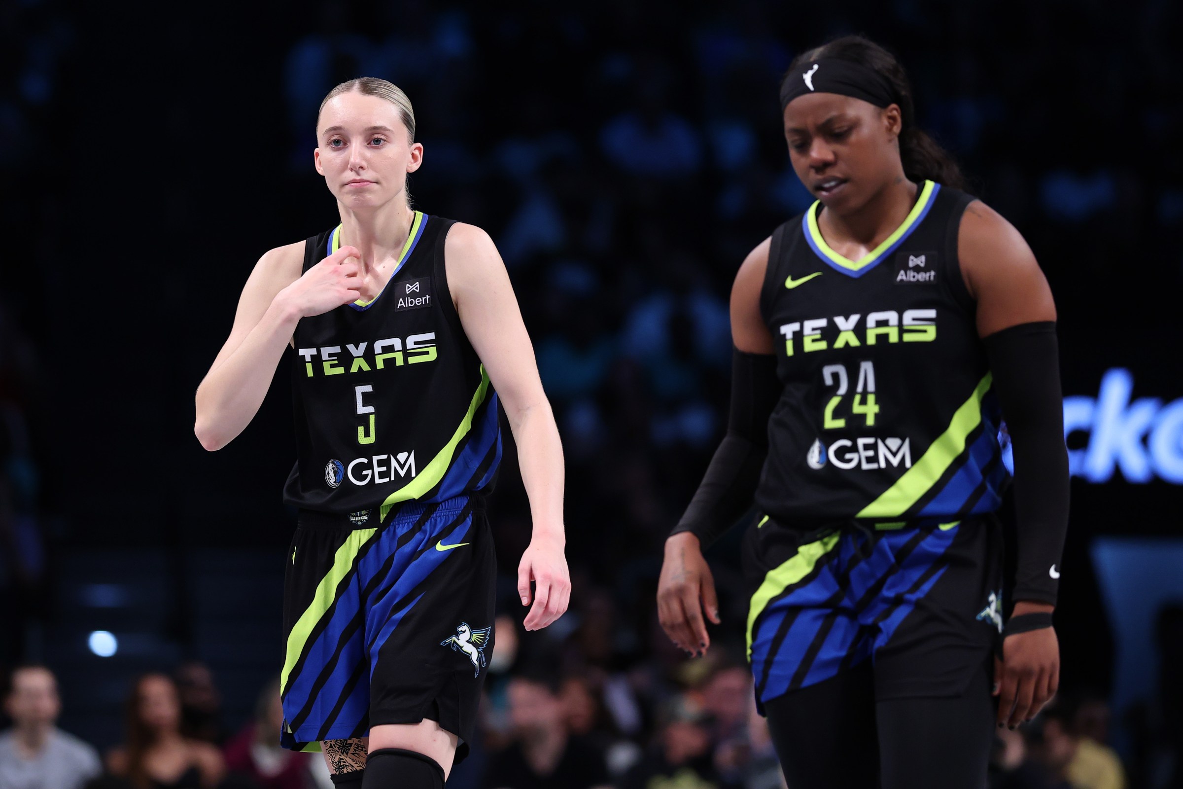 Paige Bueckers and Arike Ogunbowale.
