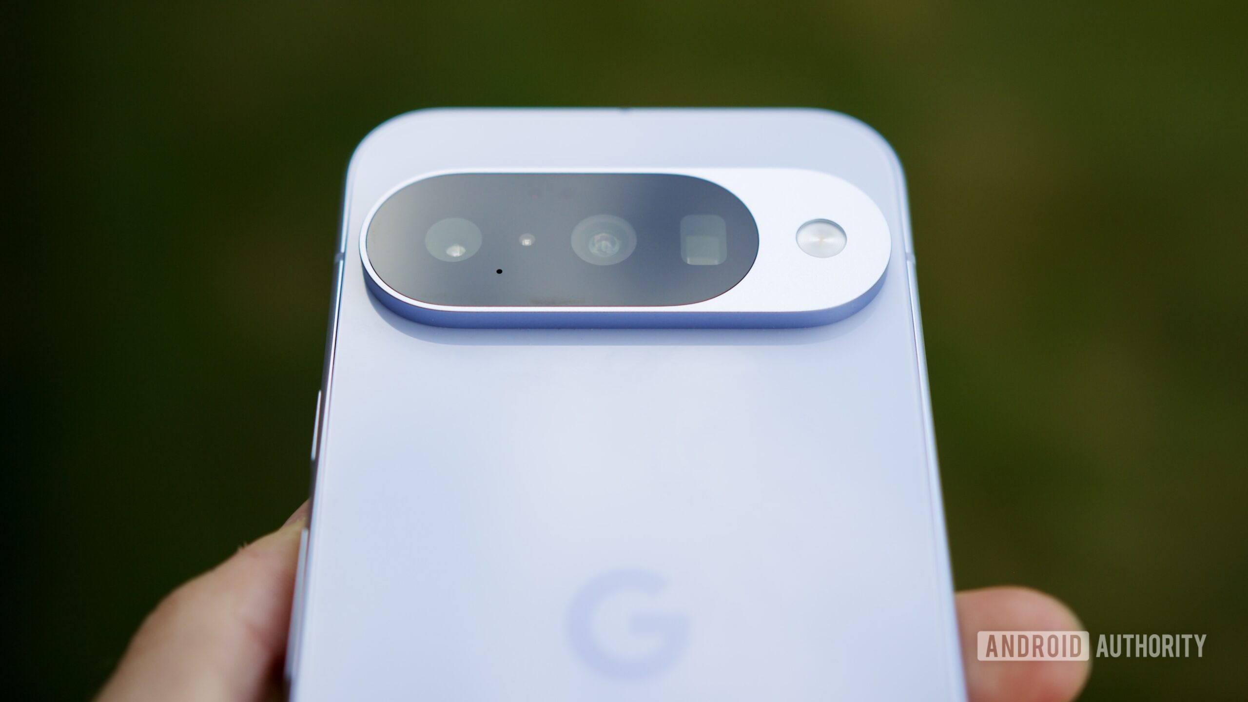 A close-up photo showing the camera sensor on the Pixel 10, including its telephoto camera.