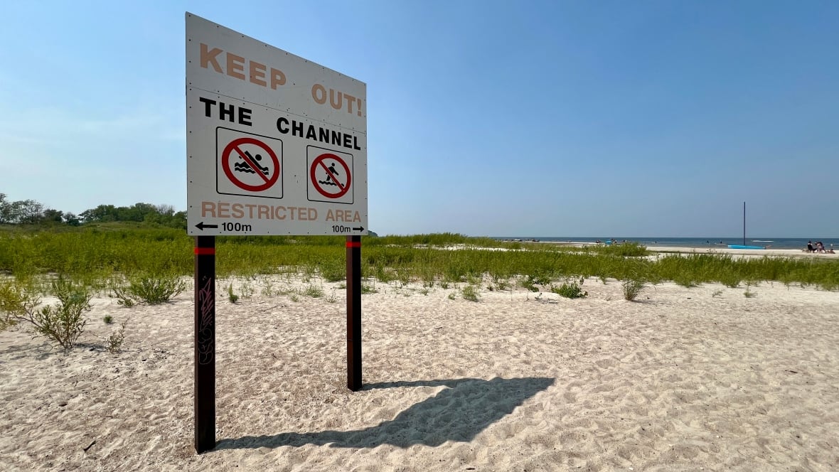 A sign says restricted area. 