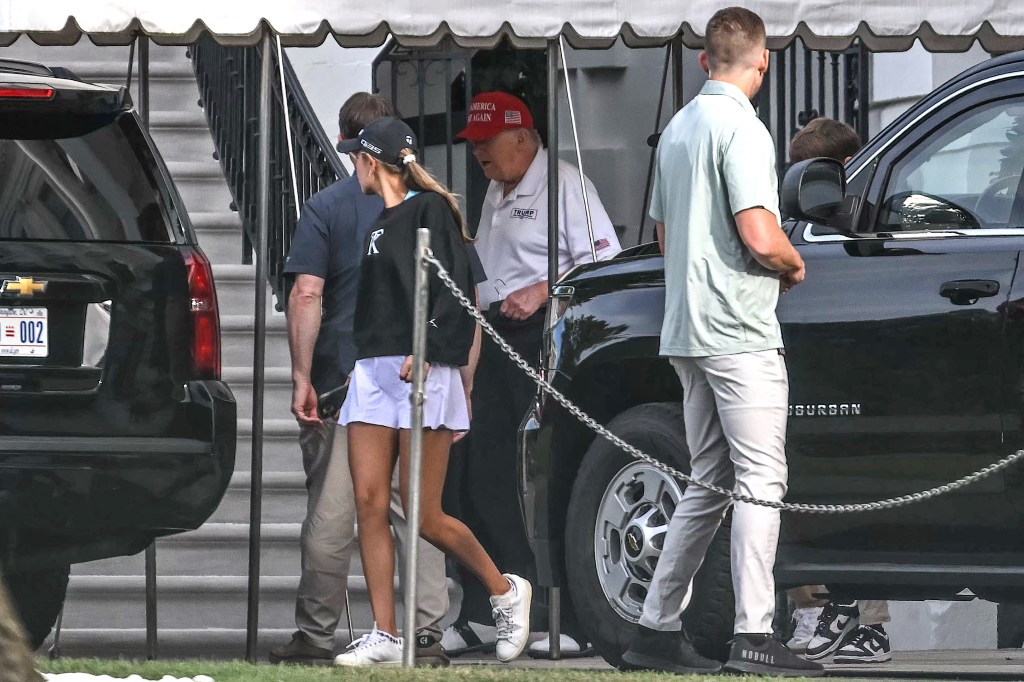 Donald Trump and his granddaughter Kai Trump leaving the White House.