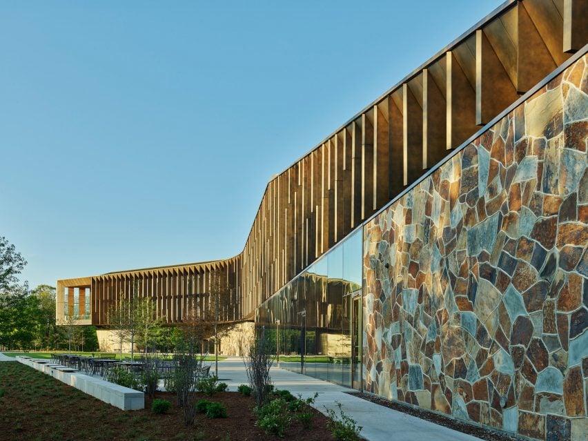 Building with stonework resembling a giraffe's hide