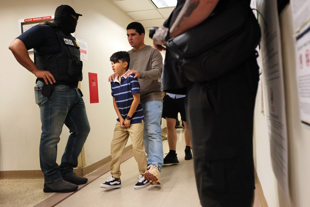 ICE agents detaining immigrants inside a New York City courthouse.