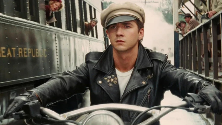 Indiana Jones and the Kingdom of the Crystal Skull, Mutt riding his motorcycle past a train