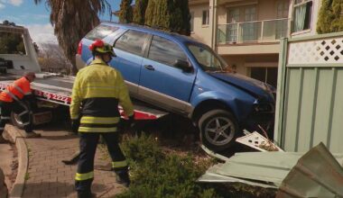 Out-of-control car smashes into yard where children had played moments earlier