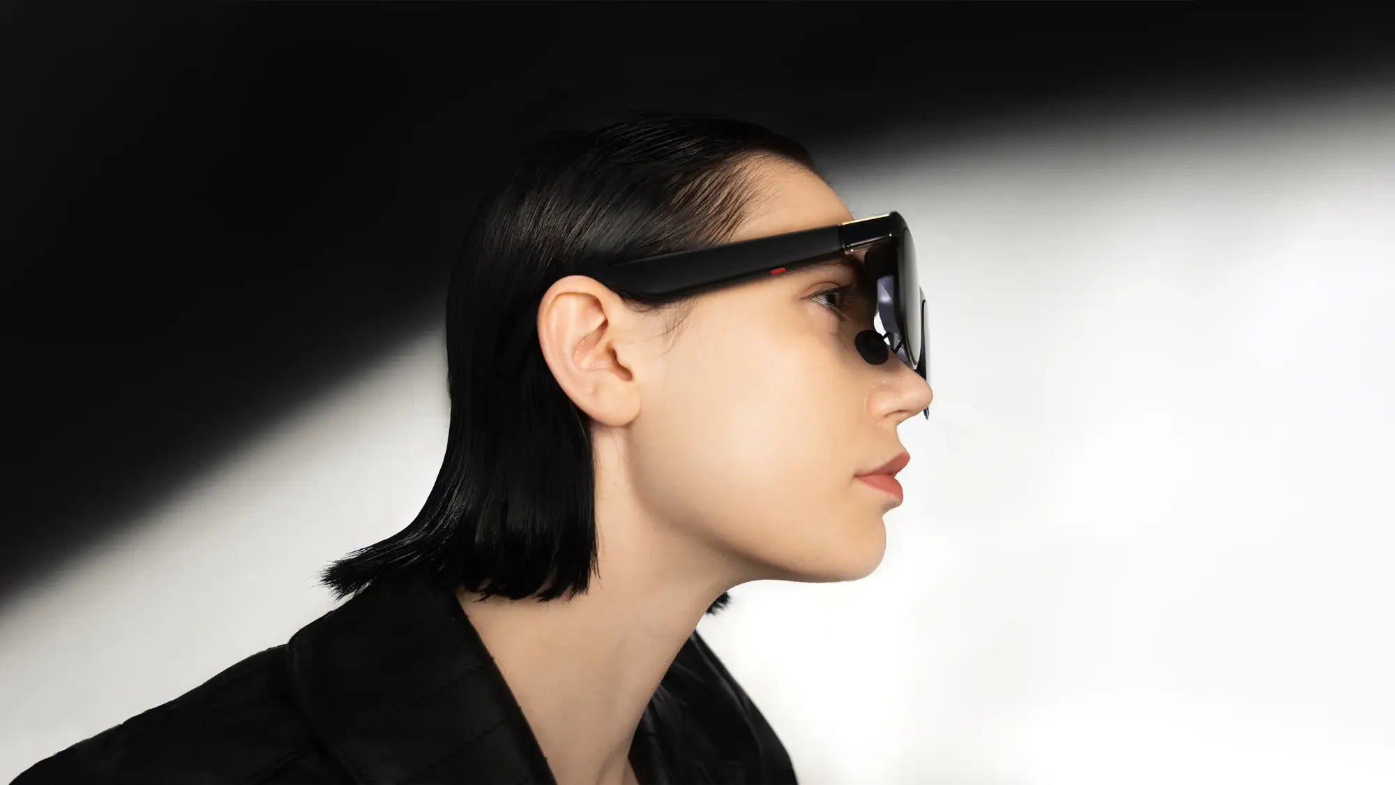 model wearing xreal one pro ar glasses