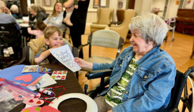 Resident of Juliette Fowler admires a child