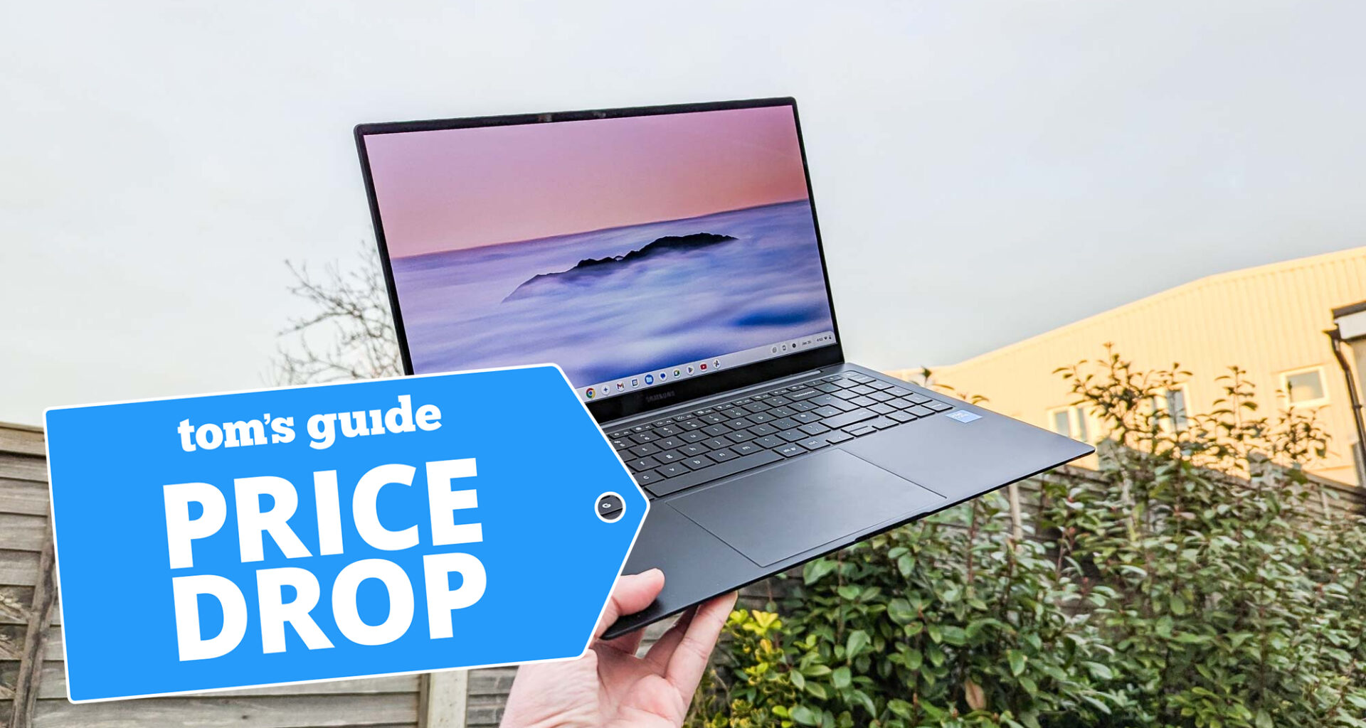 Samsung Galaxy Chromebook Plus held in air