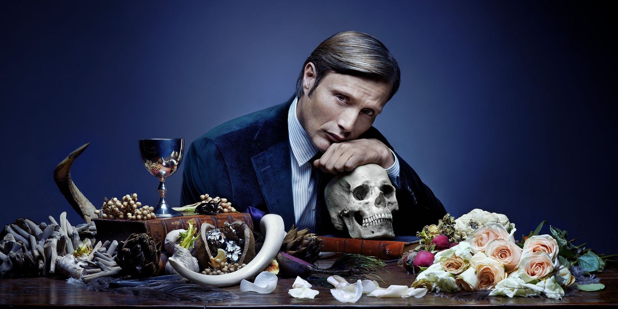 Mads Mikkelsen posing in a promotional image for Hannibal