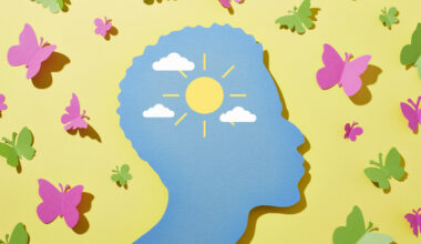 A man surrounded with butterflies and sunshine in his mind