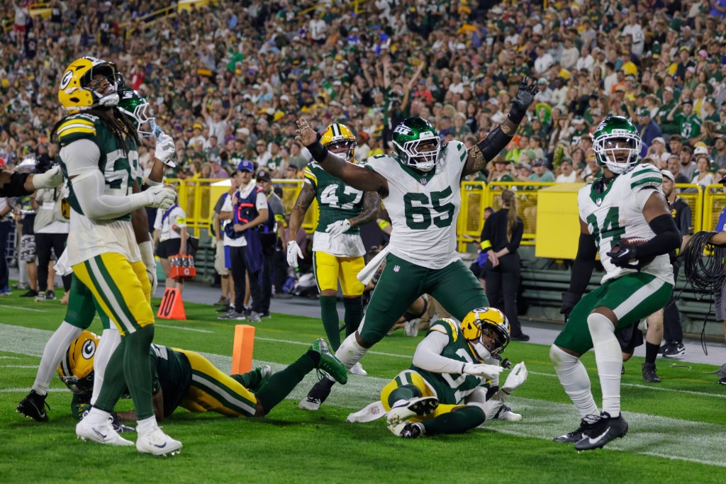 New York Jets' Stone Smartt catches a pass for a touchdown during the second half of a preseason NFL football game against the Green Bay Packers Saturday, Aug. 9, 2025.