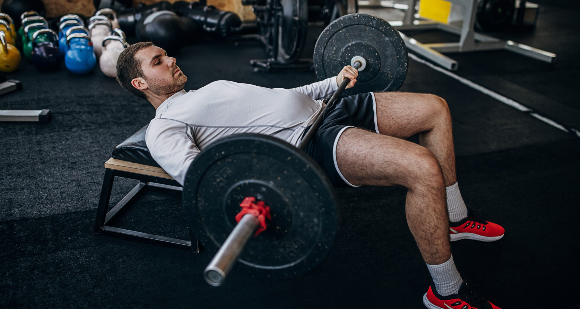 A man performing hip thrusts