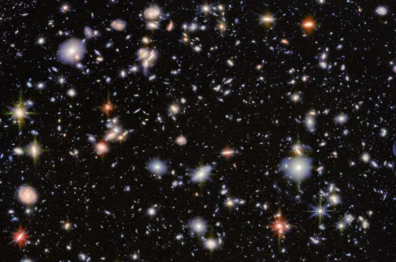 Red galaxies provide new insights into the birth of the universe