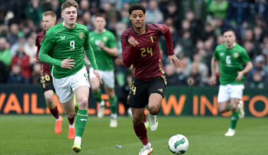 DUBLIN, IRELAND - MARCH 23: Koni De Winter of Belgium runs with the ball whilst under pressure from Evan Ferguson of Republic of Ireland during the international friendly match between Republic of Ireland and Belgium at Aviva Stadium on March 23, 2024 in Dublin, Ireland. (Photo by Charles McQuillan/Getty Images)