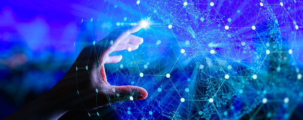 Impression of technology graphic with hand touching point in field.