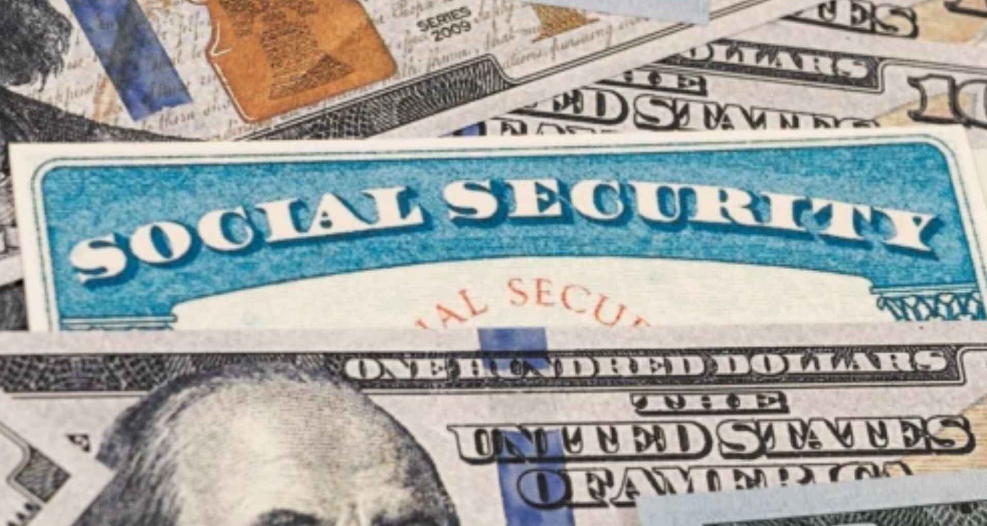 Social Security card on top of U.S. hundred-dollar bills representing financial challenges for retirees in 2026