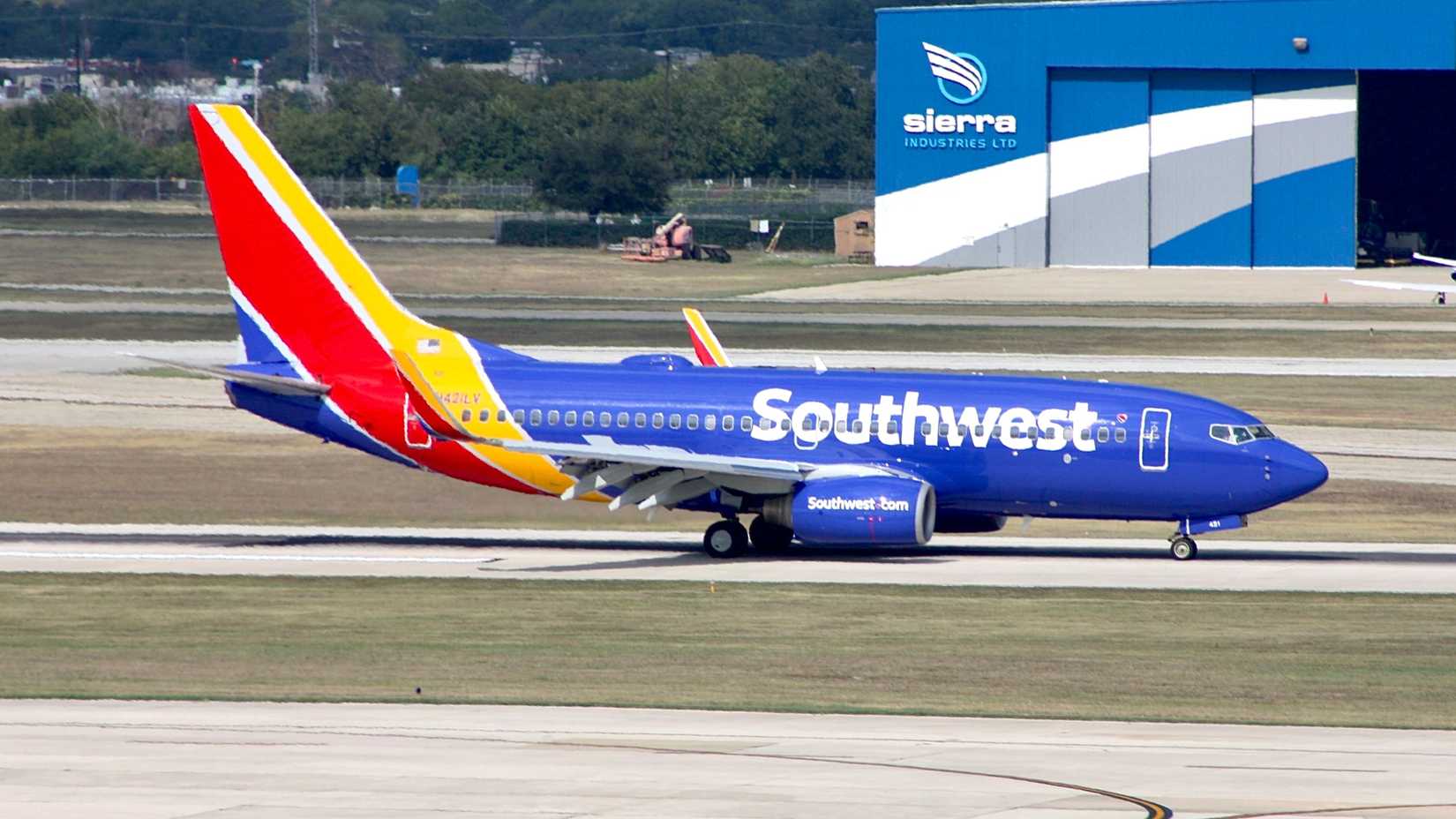 Southwest Airlines Boeing 737-700 taxiing at San Antonio International Airport SAT shutterstock_2276353555
